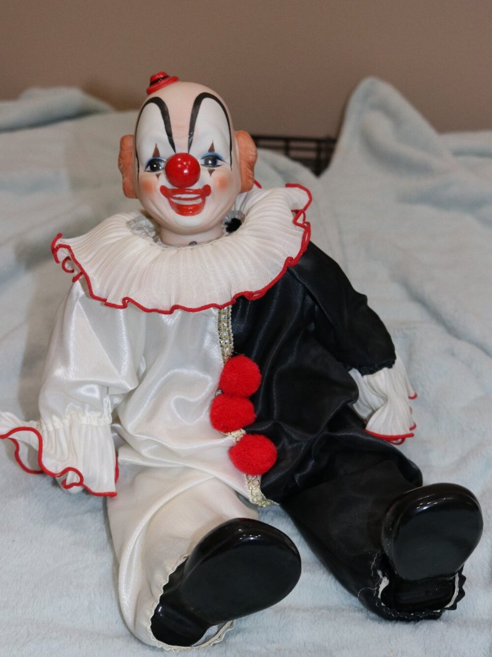 Vintage 1980s ceramic clown china doll.